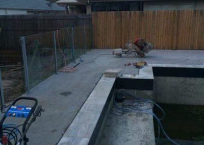 BEFORE Pool surround in Brightwater 1