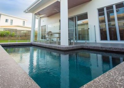 Polished concrete pool coping and surrounds. Sealed with acrylic sealer with grip additive for a non slip finish 1